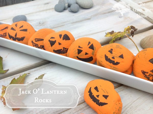 Easy painted Jack O' Lantern rocks! Such a fun and simple Halloween craft idea! 