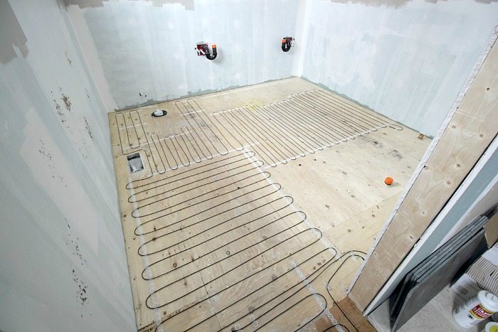 How to install heated tile floors in your home! Learn how to avoid all the little mishaps that can happen during the project!