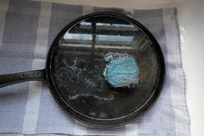 How to Clean a Cast Iron Pan - Scrub