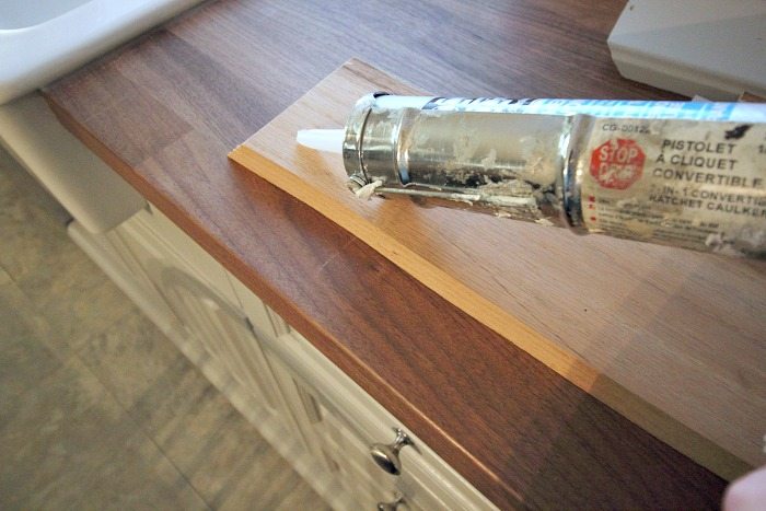 It's easy to update the look of your old kitchen cabinets with some simple mouldings and a few basic tools!