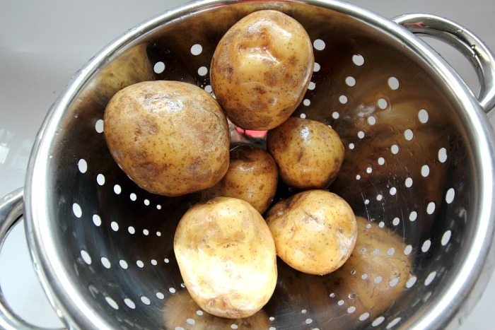 Learn how easy it is to come home to perfect baked potatoes when you make baked potatoes in a crock pot!