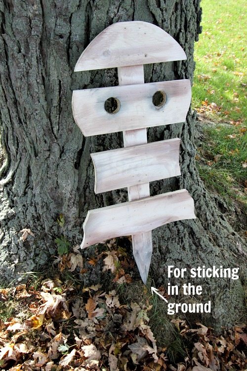 DIY Halloween decorations are the best! Follow along with this simple guide and make your own scrap wood ghost decorations. They look amazing!