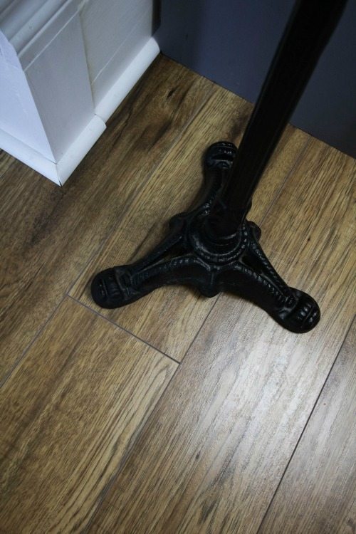 We chose laminate flooring for the main rooms in our home instead of hardwood and we haven't regretted it for a second!