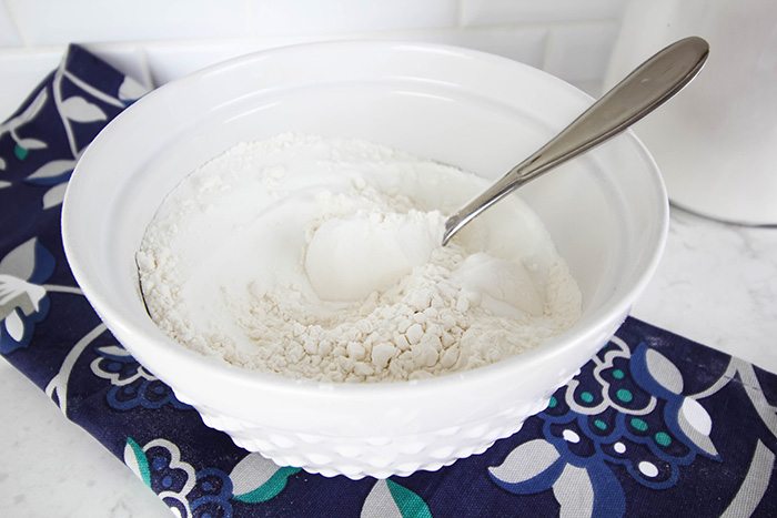 Mixing up homemade cake mix in a bowl.