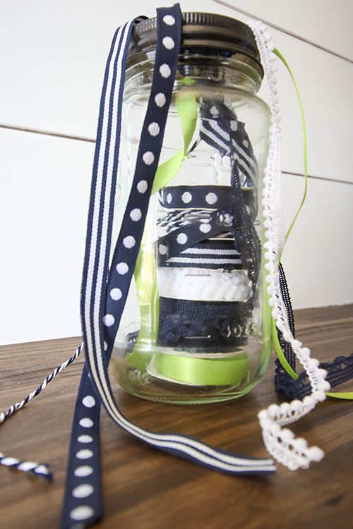 Organize your ribbons with this DIY mason jar ribbon organizer!