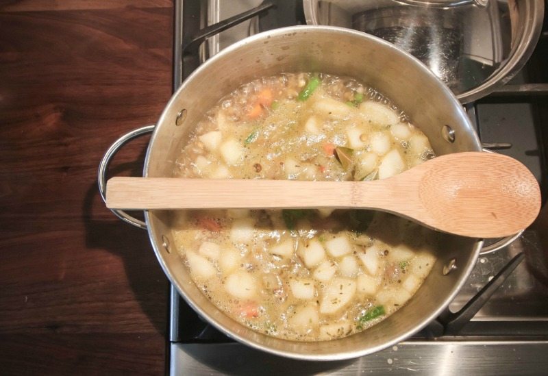 Keep your stove cleaner and make your time in the kitchen less stressful with the wooden spoon on the pot trick! Here's how to stop pots from boiling over.