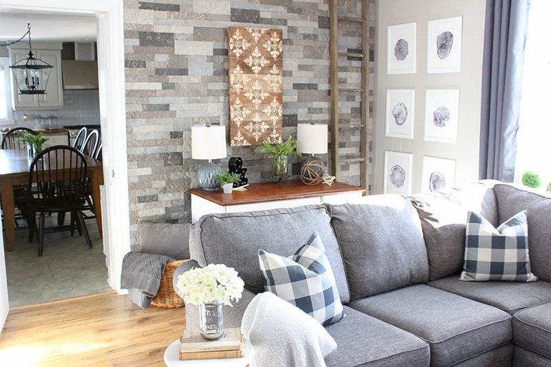 This wood wall art project is so easy to complete and will instantly bring farmhouse style to your home! The best part is that anyone can make wall art like this using a basic stencil and wood reclaimed from a shipping pallet! 