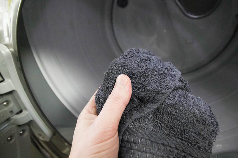 Clean your curtains in the dryer. Add a wet towel.
