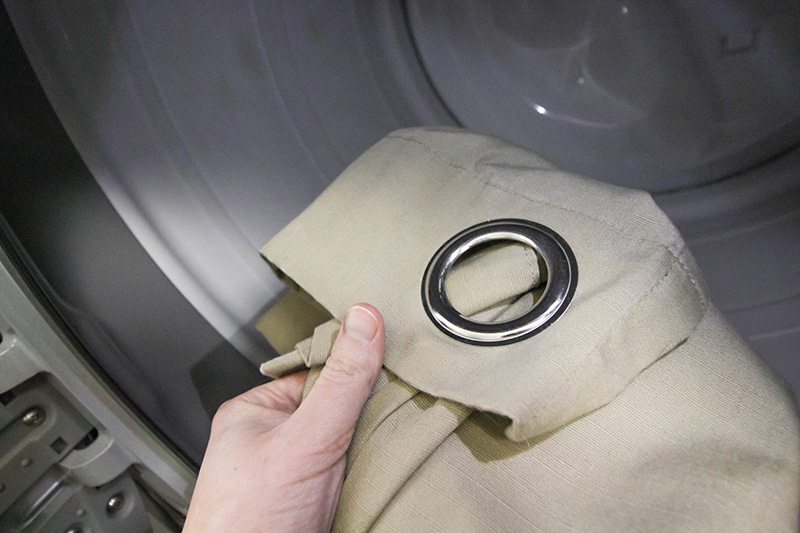 Clean your curtains in the dryer. Add a the curtains.