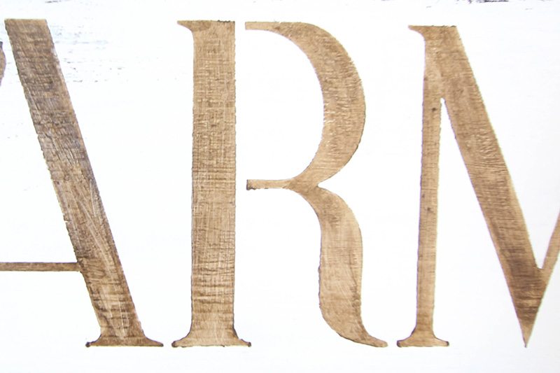 Try this DIY stencilled farmhouse sign for an easy way to bring a big dose of rustic farmhouse style to any part of your home!