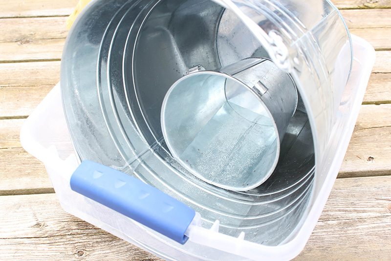 How to Age Galvanized Containers - In the tub with the mixture
