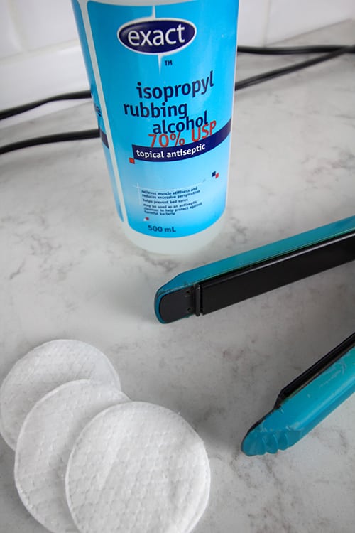 Follow these simple steps for how to clean a flat iron to get your hair straightener sparkly clean in just a few minutes. This is definitely an often overlooked task, but well worth your time!