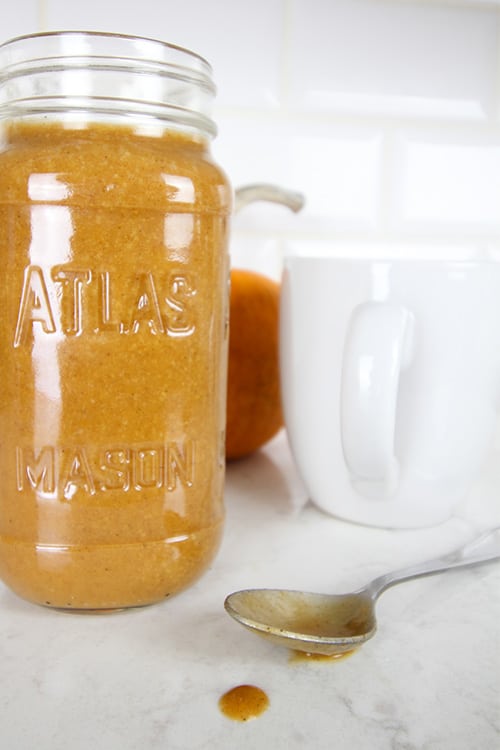 A mason jar filled with homemade pumpkin spice creamer