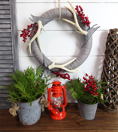 This DIY wool Christmas wreath is a fun, simple way to make your own Christmas wreath for your front door this year! Whip one up in a few minutes then add whatever embellishments you like!