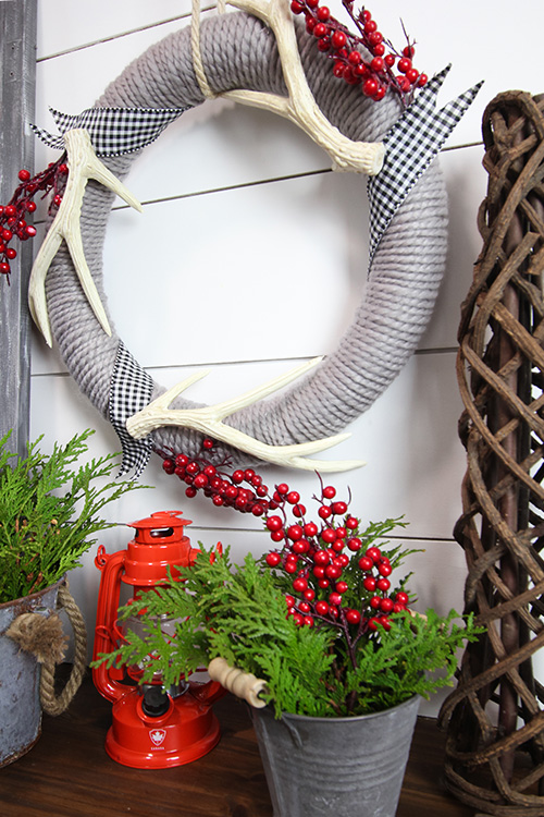 This DIY wool Christmas wreath is a fun, simple way to make your own Christmas wreath for your front door this year! Whip one up in a few minutes then add whatever embellishments you like!