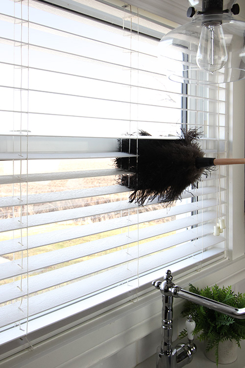 Here's the simple, straightforward way to clean window blinds so you can get that dusty mess under control once and for all!