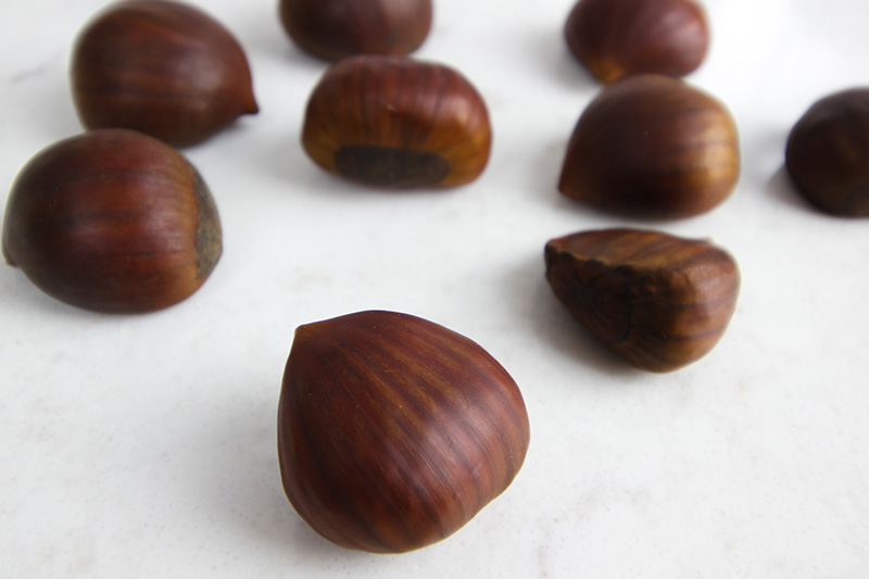 Chestnuts! Waiting to be roasted on an open fire.