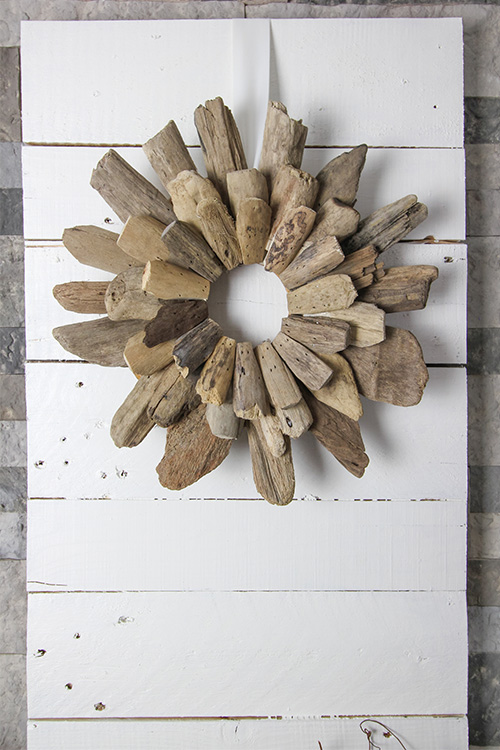 This rustic shiplap-inspired wall art is the perfect inexpensive solution to fill a blank wall or add some character to a dull space!