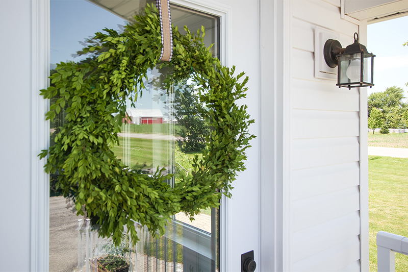 Boxwood is one of my favourite types of greenery to decorate with and this DIY boxwood wreath is an easy and affordable project that works for any time of year!
