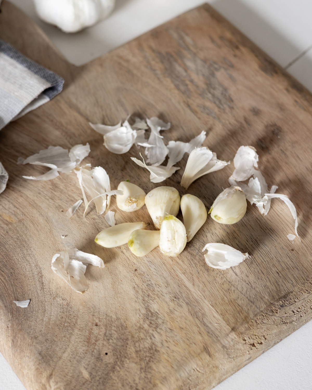 Peeled garlic with the skins removed.