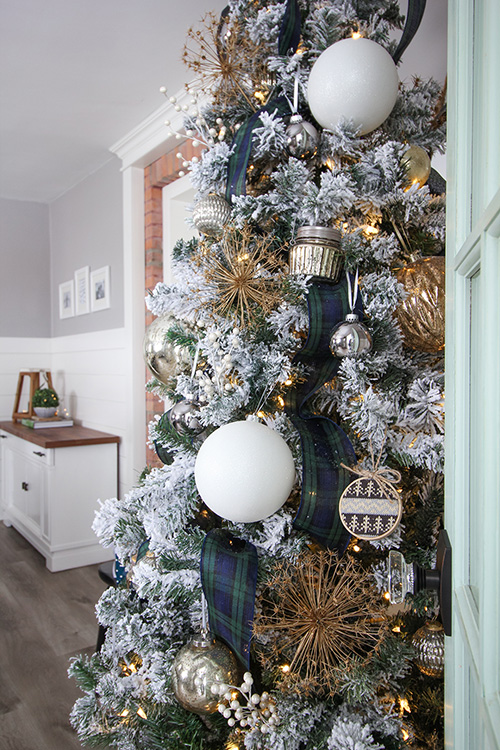 In this post I'm going to add to your Christmas decorating bag of tricks by showing you how to add vertical ribbon to a Christmas tree for a unique look!