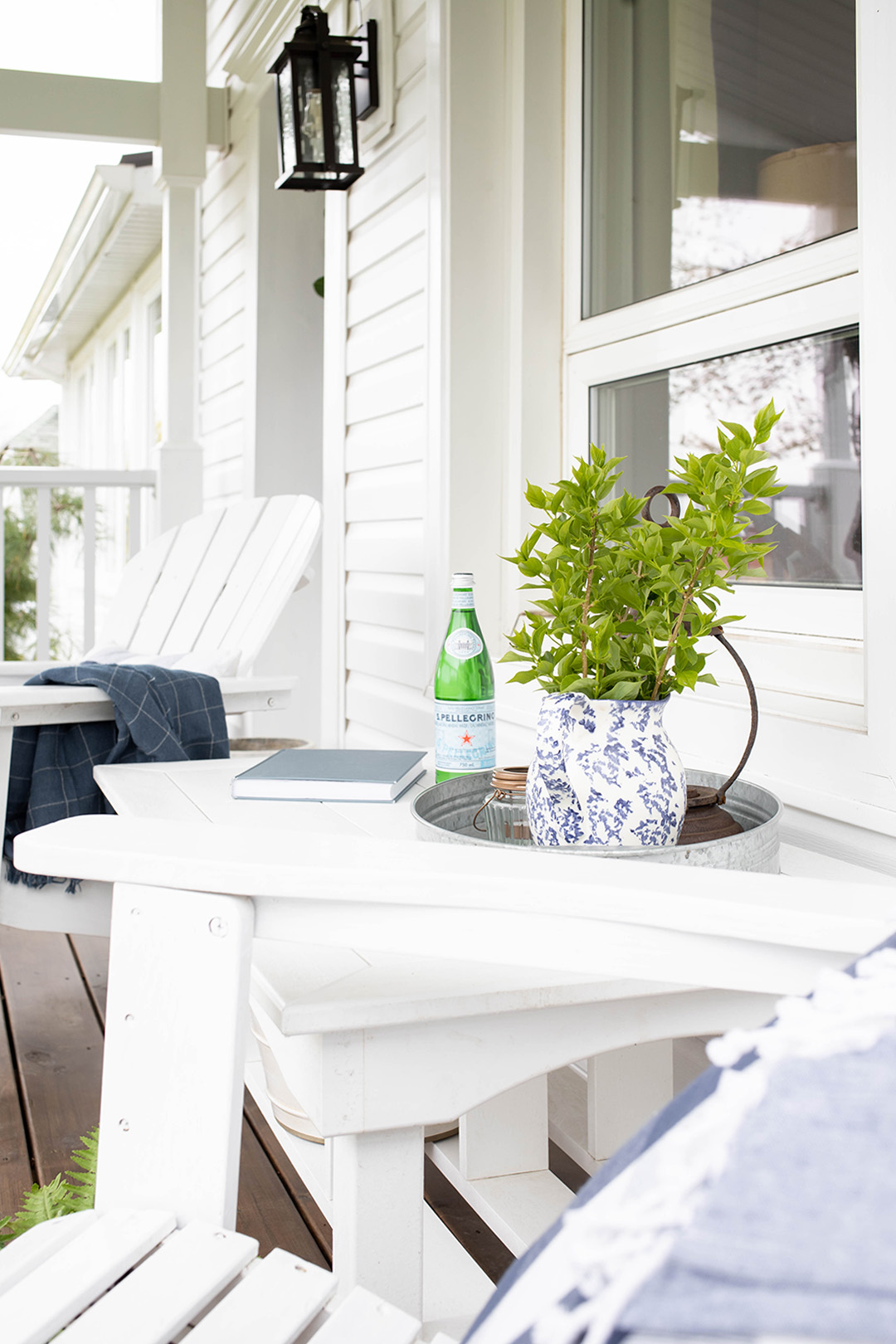 Just some thoughts on setting up an outdoor coffee table that's both pretty to look at and functional! These ideas should keep you from having to run out to your porch to bring everything in every single time it rains this summer!