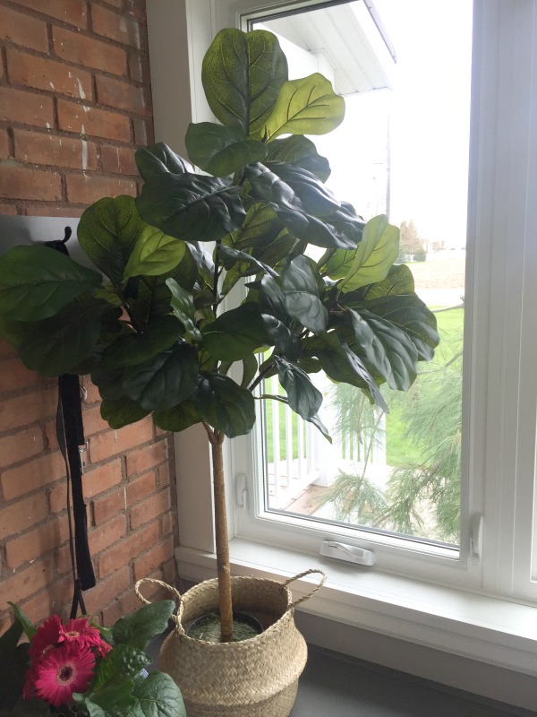 A faux fiddle leaf fig tree can add a good dose of no-maintenance greenery to your home, but they can be a little tricky to get right. Here are my tips!