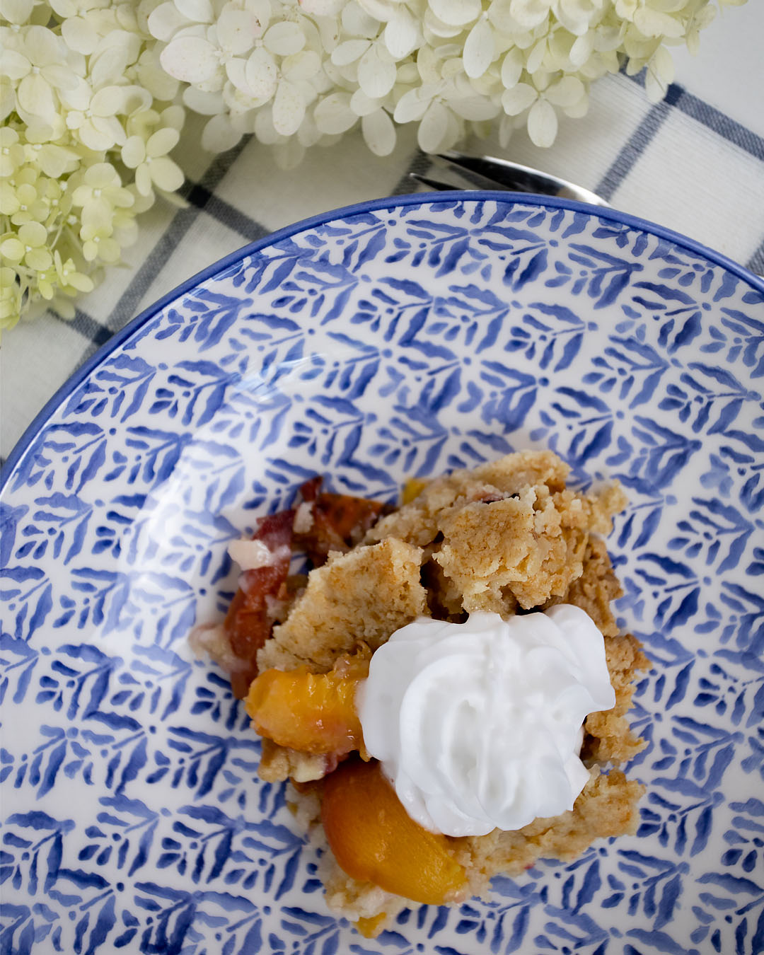 Try this super simple three ingredient peach cobbler to take advantage of all those fresh peaches you've been picking at the orchard this summer!