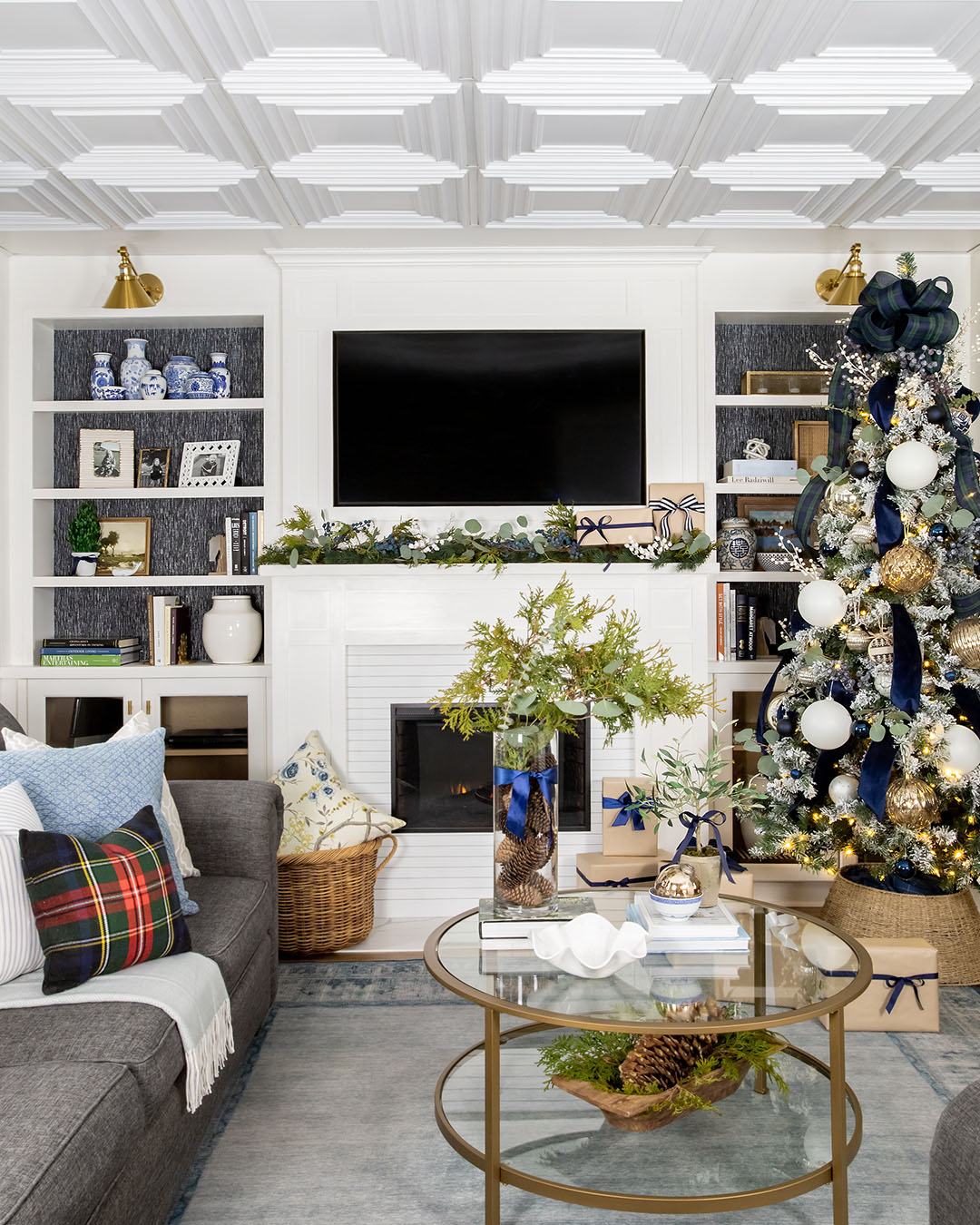 The first tree is up and it's officially Christmas season in our house! Today I'm going to share my blue and white Christmas decor from our living room!