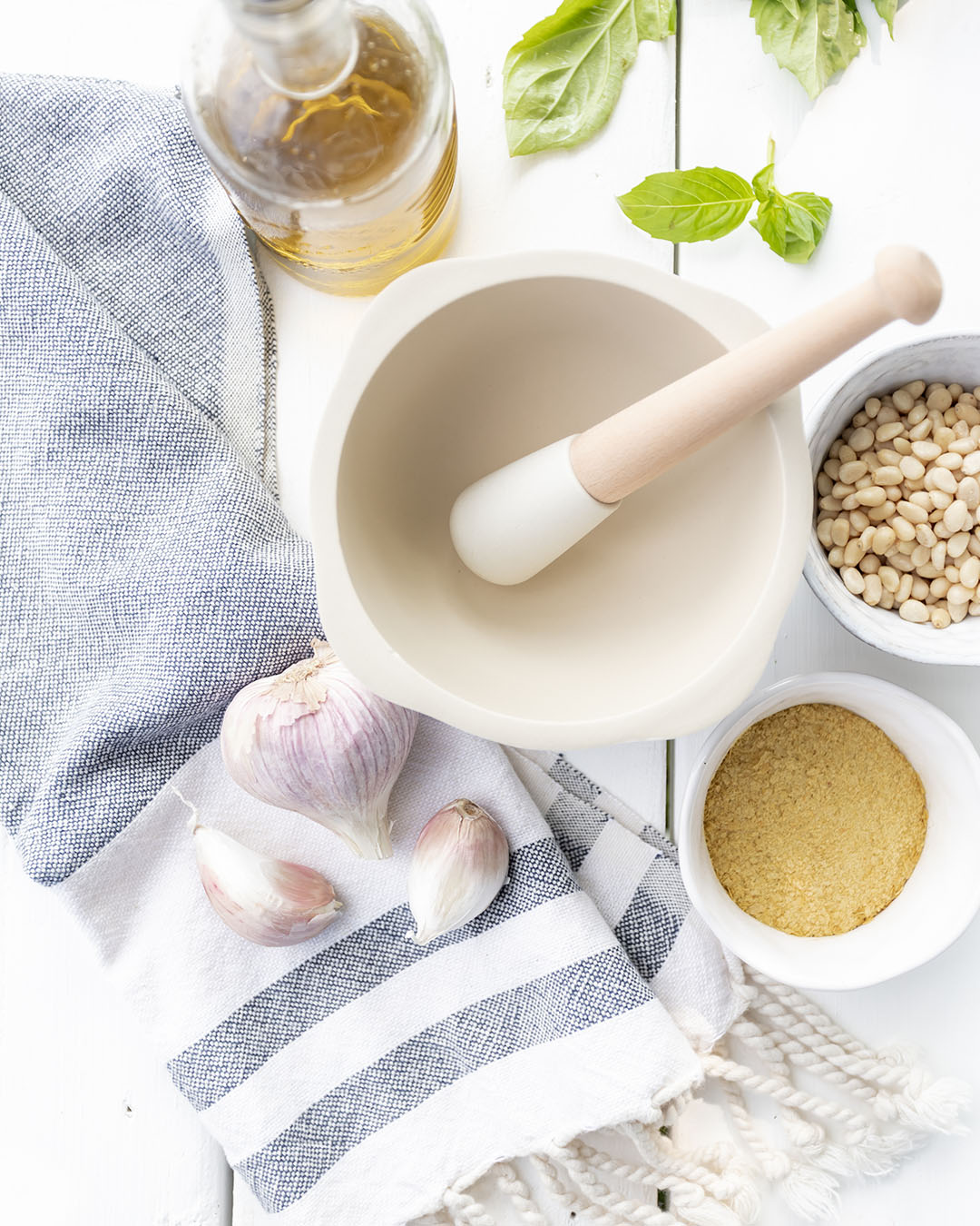 Have you ever made real pesto from scratch with a mortar and pestle? In today's post I'll share my plant-based version of the recipe as well as the process for making pesto by hand!