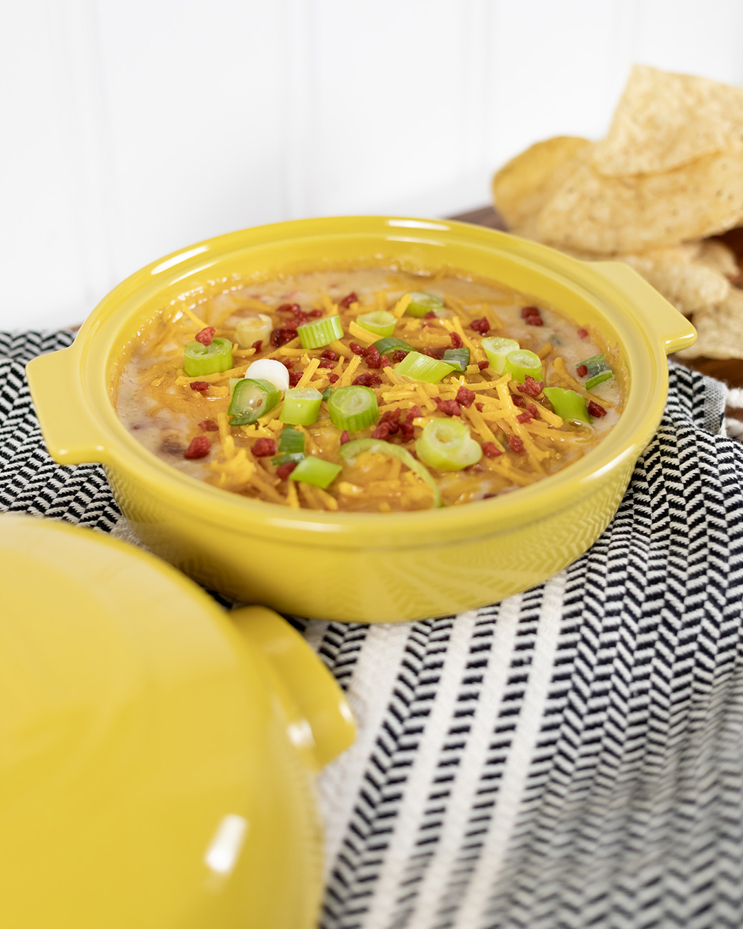 Try this plant-based jalapeño popper dip recipe for your next potluck, gathering, or game day! This is one that everyone - plant-based or not - can enjoy together!
