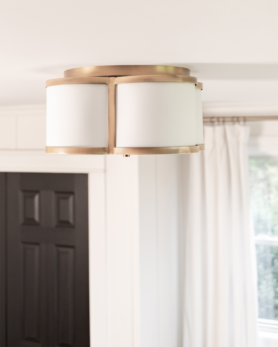 Today I'm sharing a little bit more about our new brass flushmount bedroom light fixture and why I'm so happy with it.