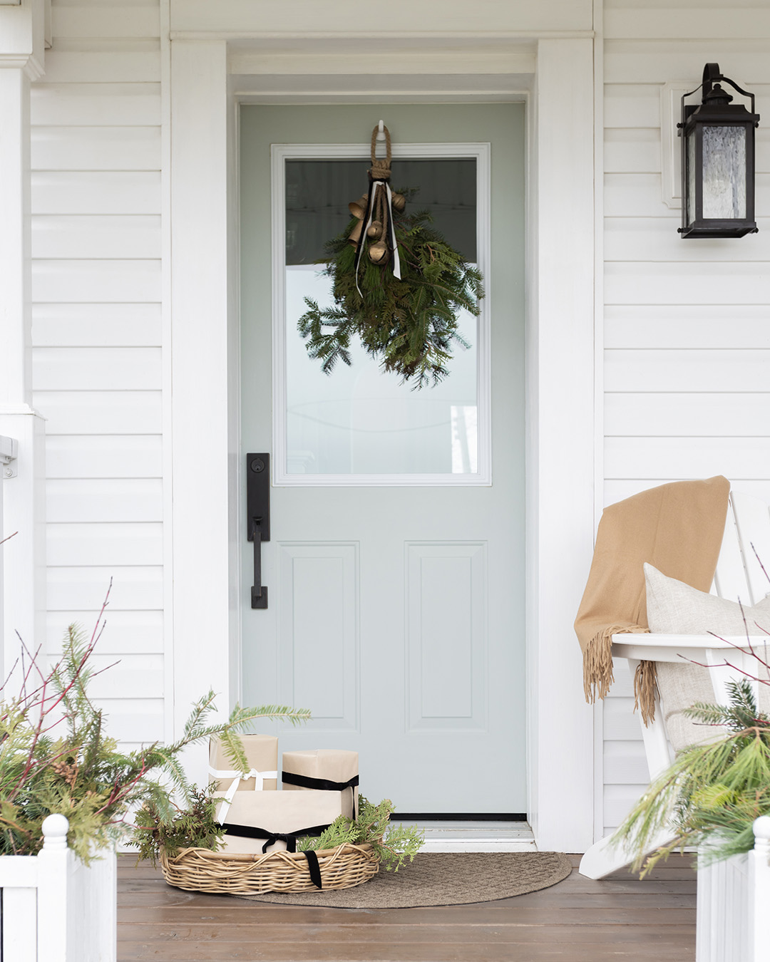 This year's front porch decor is foraged and a little wild, once again and I had a great time piecing it together from this and that found around our property. Here's a look at our natural Christmas front porch 2022.
