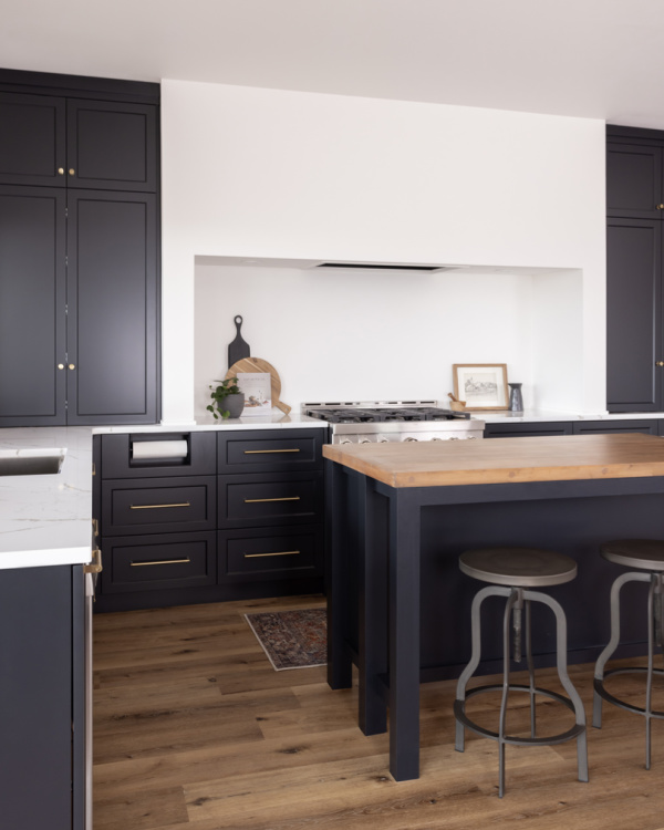 Modern industrial black kitchen with cooking alcove