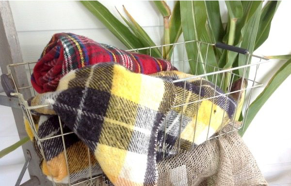 Plaid blankets in fall colors.