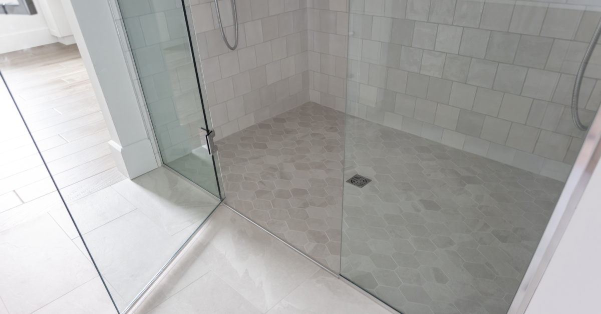 Beautiful tile work in a dream ensuite bathroom.