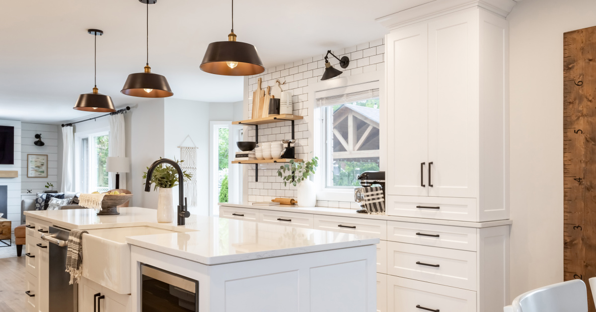 White kitchen with black accents.