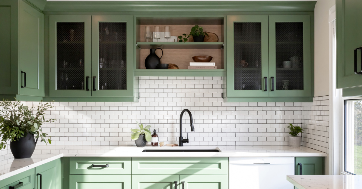 Rich green farmhouse style cabinetry.