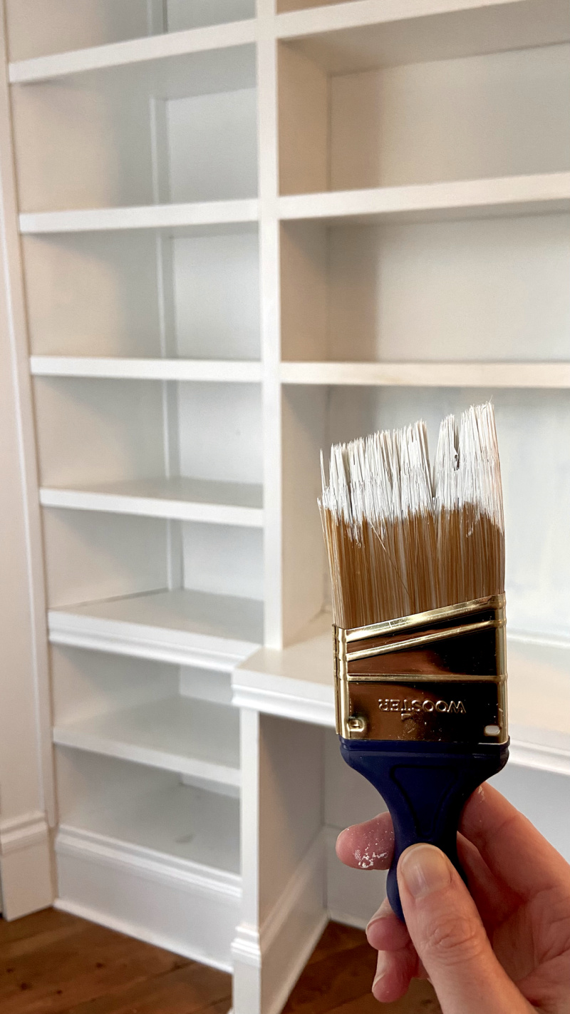 Painting shelves.
