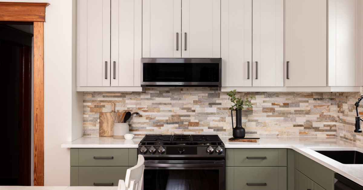 Soft green lower cabinets paired with a pale mushroom colored uppers.