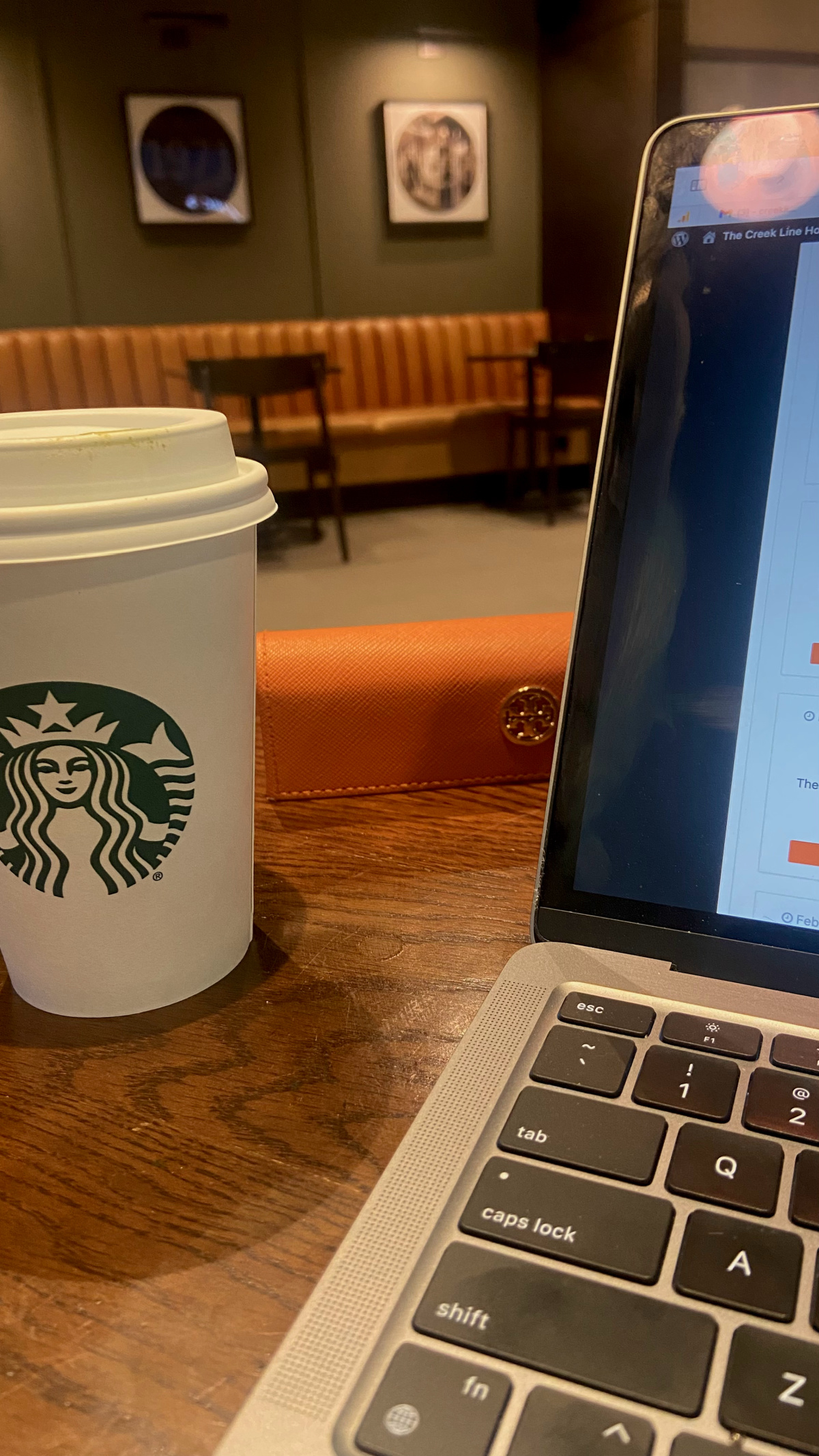 Working in a Starbucks.