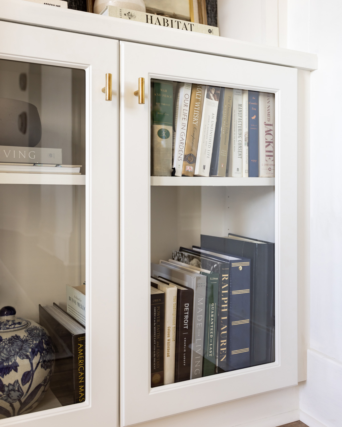 Mixing new and old books on a built-in bookcase.