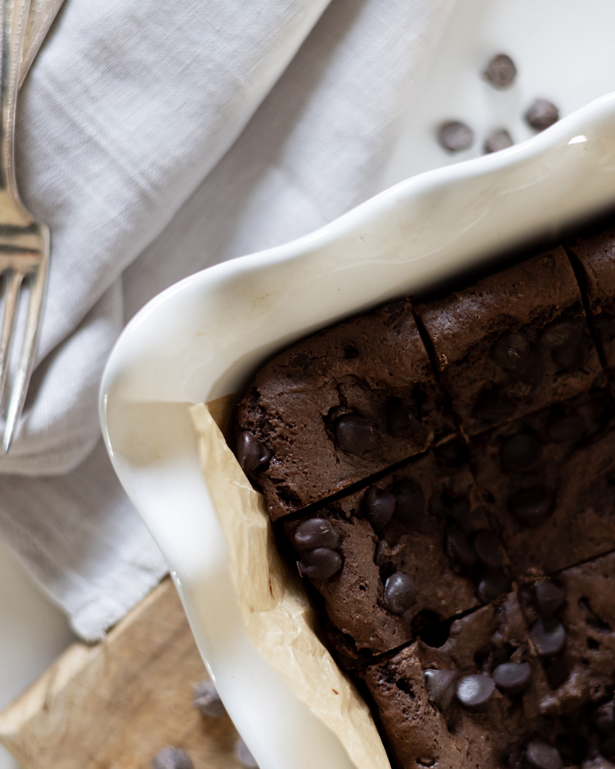 Indulgent brownies in a ruffled Emile Henry baking dish.
