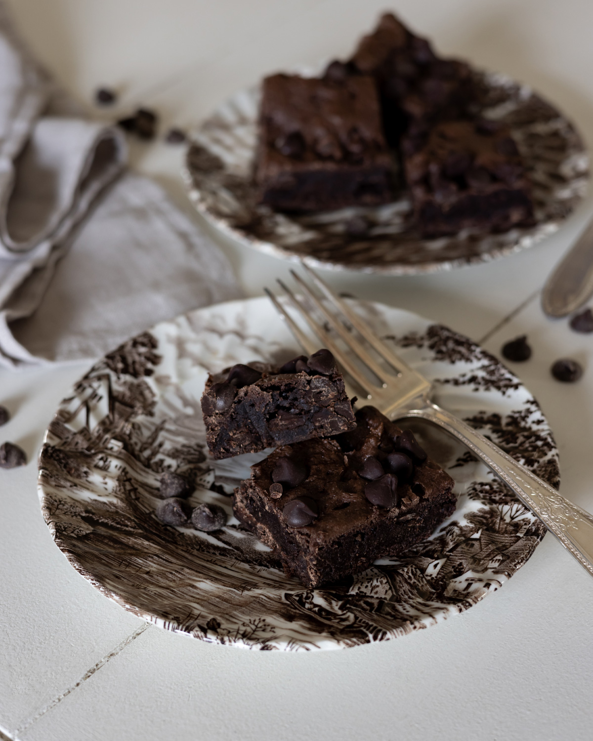 Cake mix brownie squares served on ironstone plates.