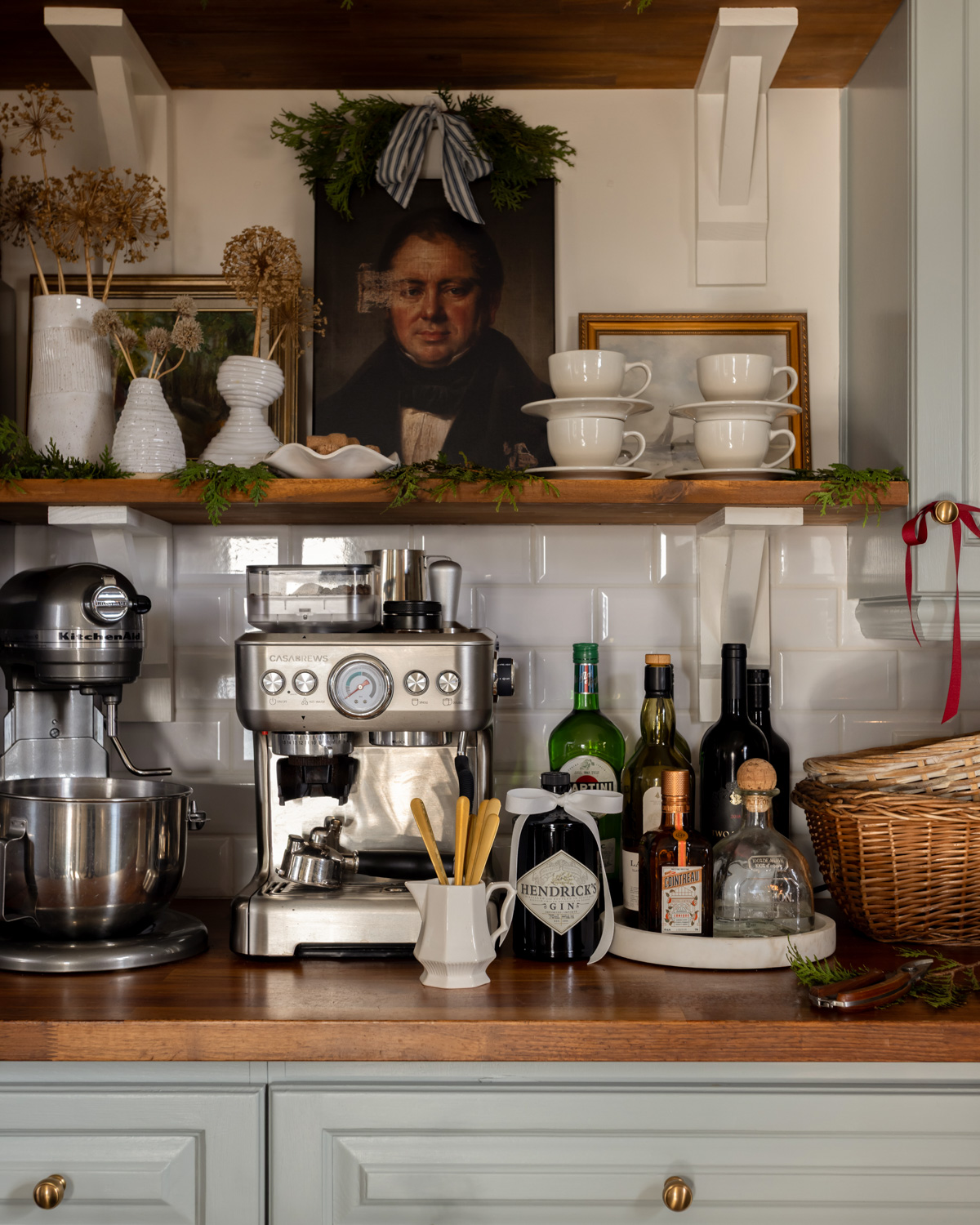 Christmas coffee bar with blue cabinets, wood counters, and English country style decor.