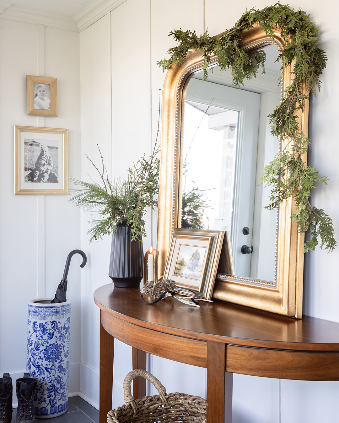 A natural cedar garland hung over a mirror.