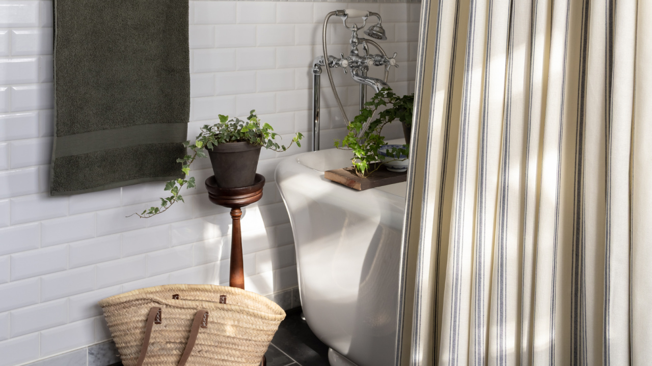 How to use a custom curtain as a shower curtain.