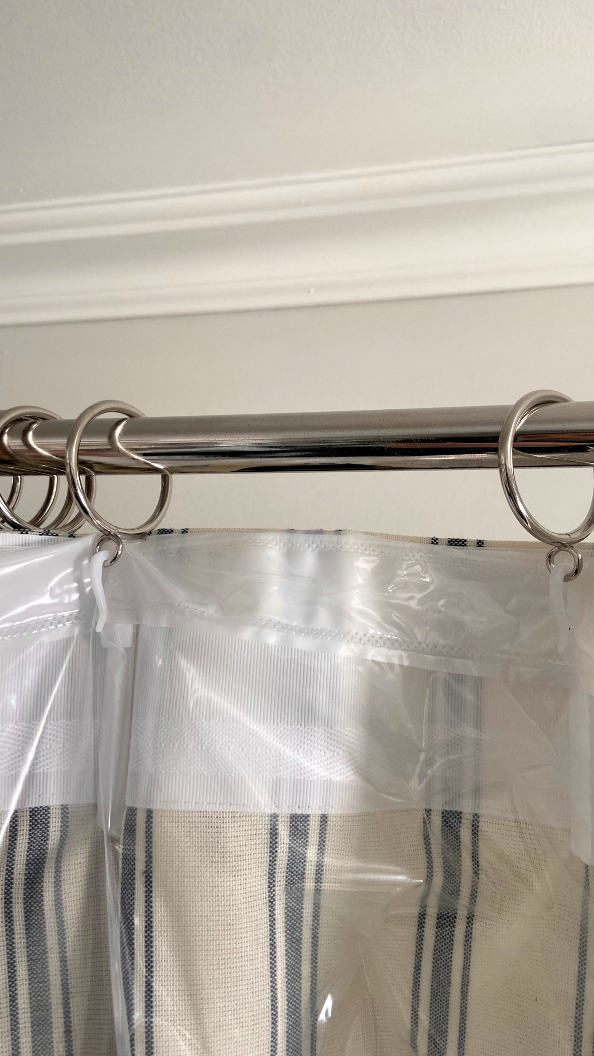 Custom curtain as a shower curtain with liner.