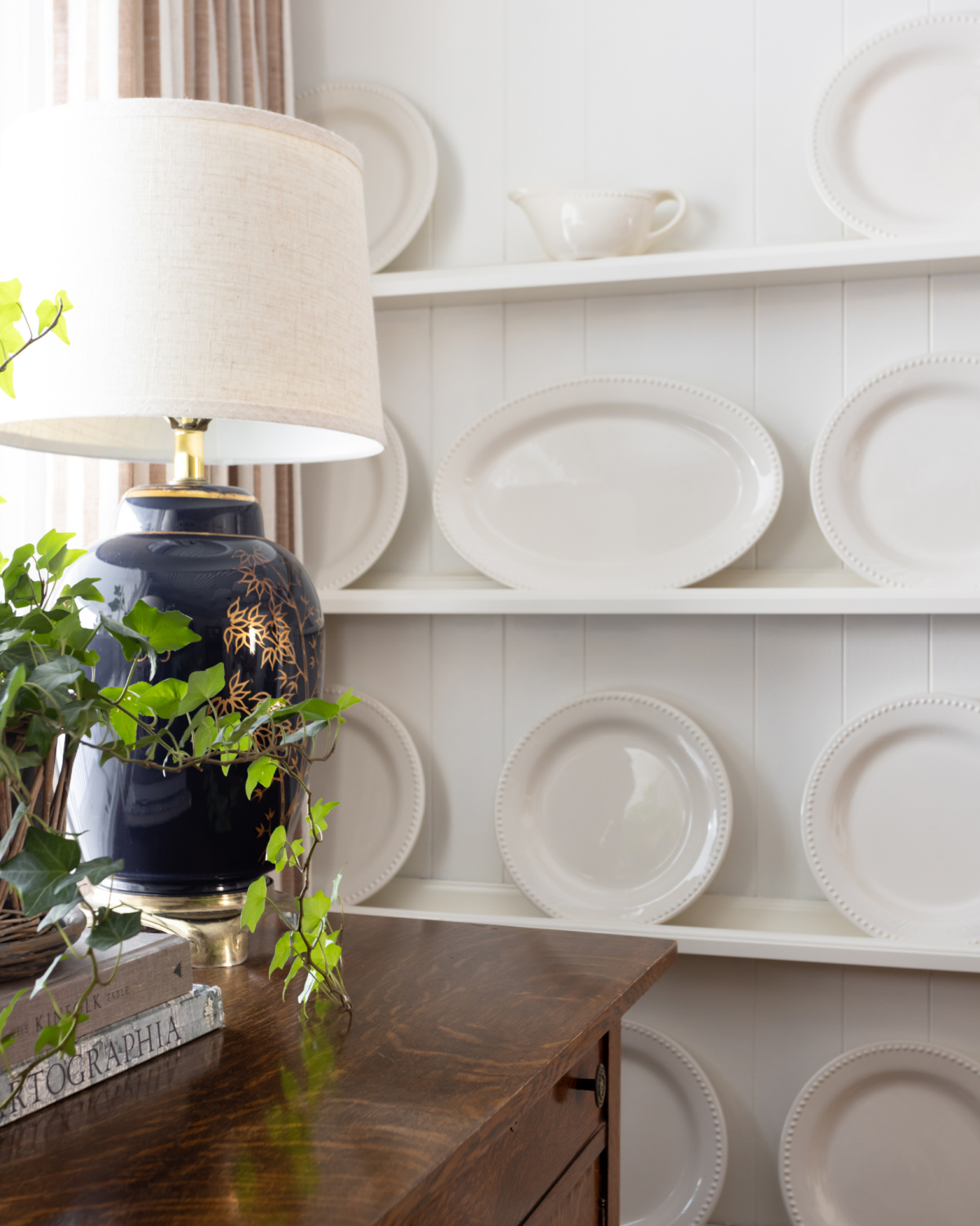 A jar style lamp with a slightly smaller shade creates an elegant look.