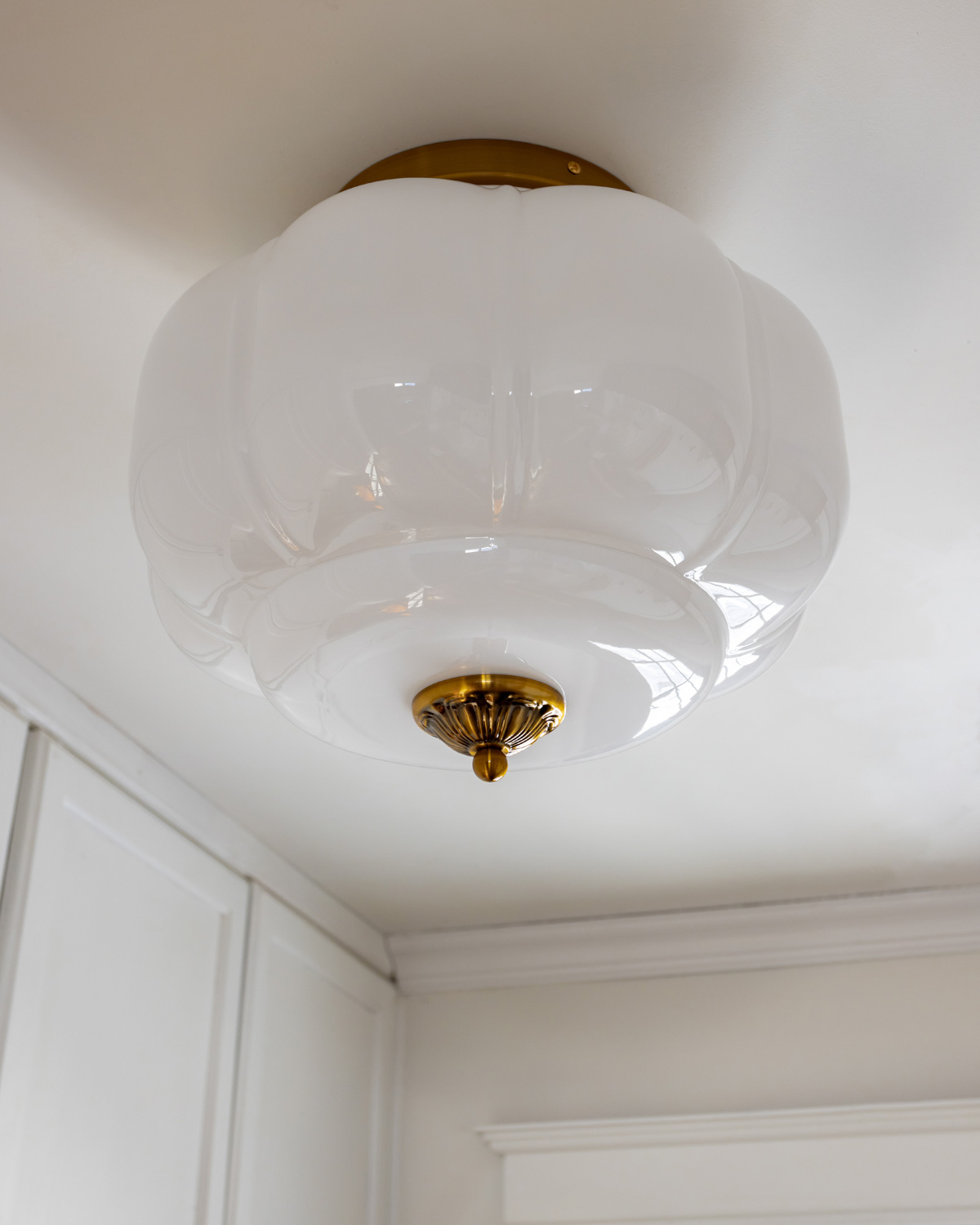 Our new milk glass flush mount light.